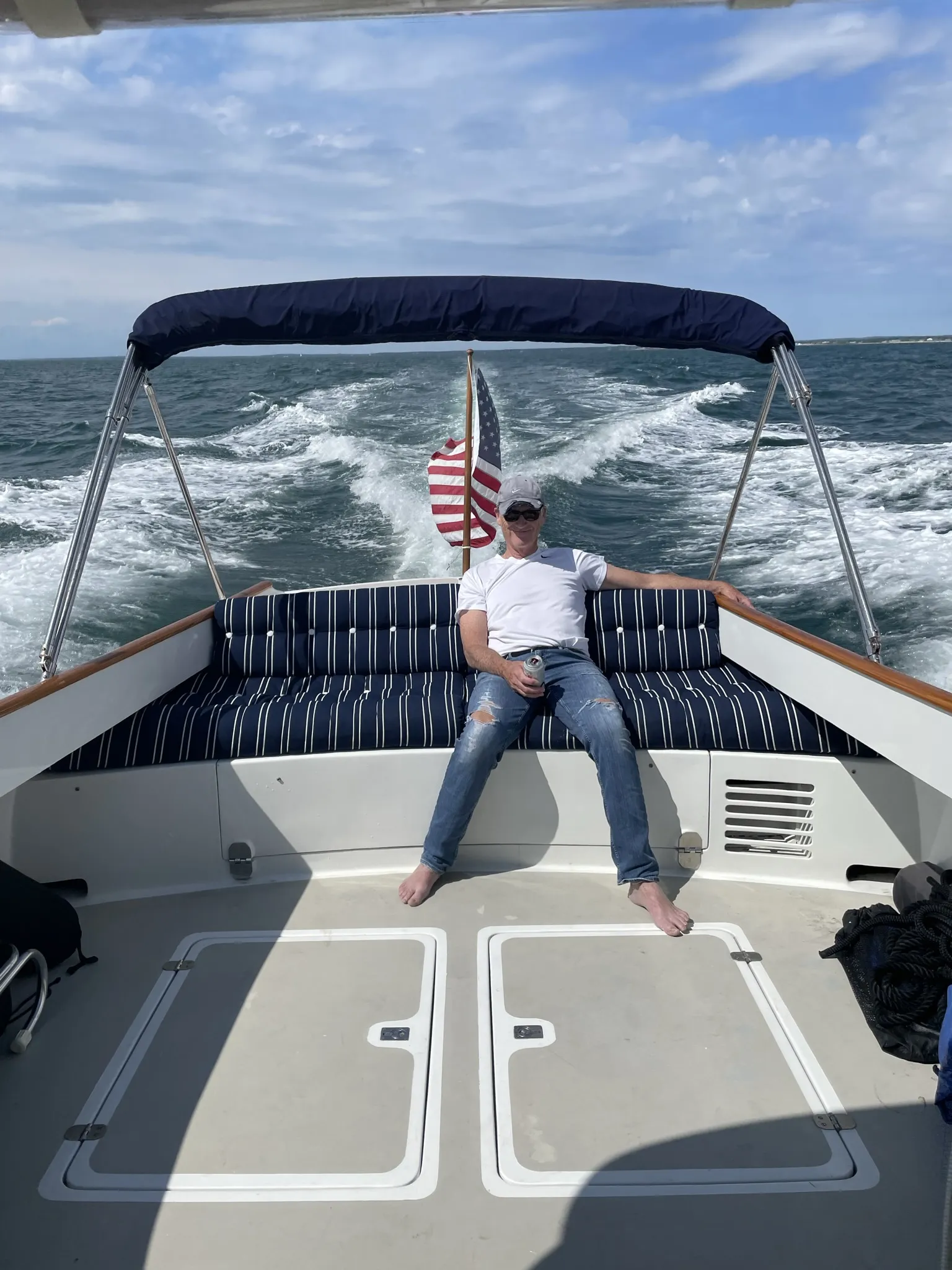 Captain relaxing on the aft settee